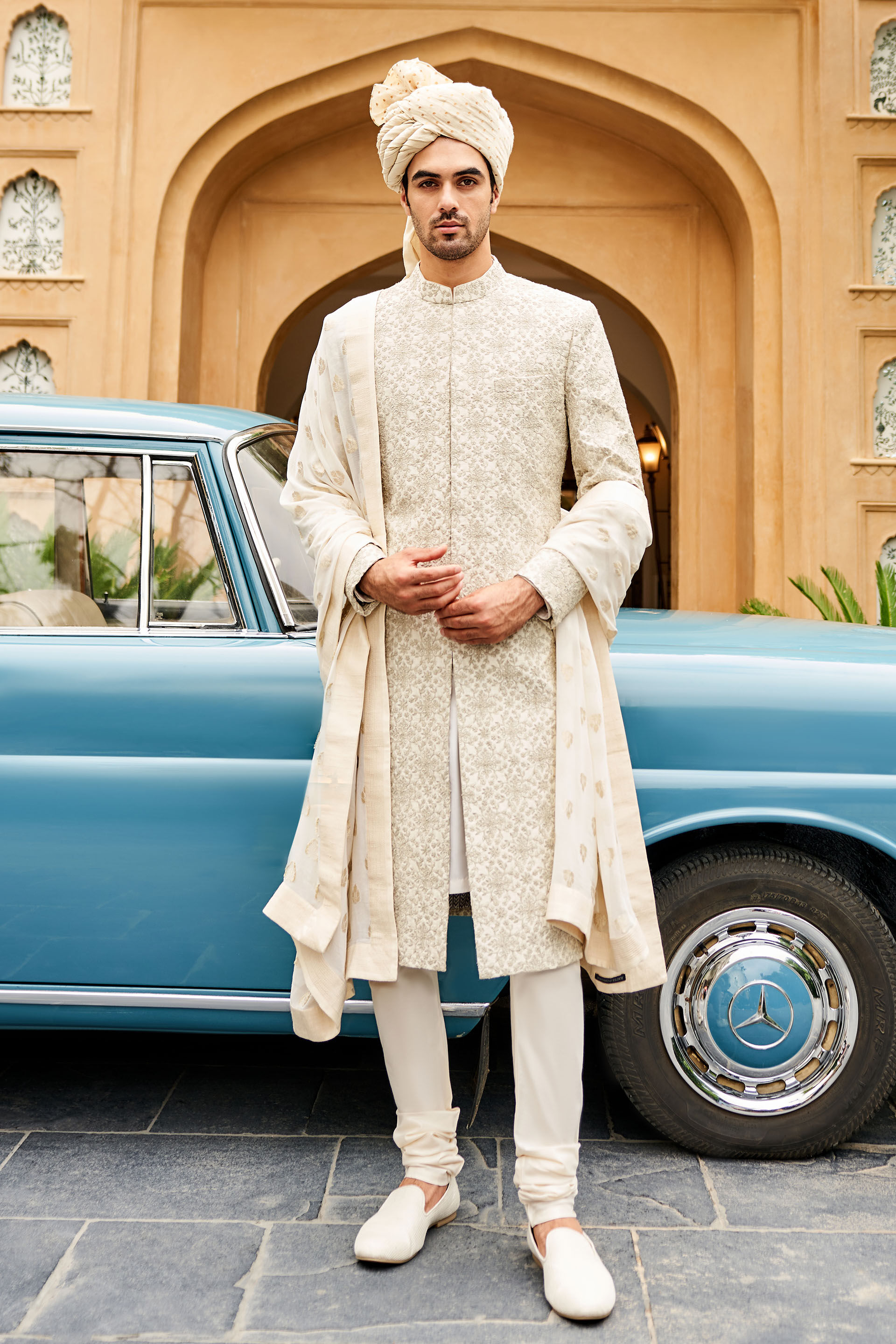 Off white top sherwani for groom